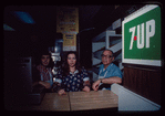 Group portrait at the register, Chicken Gourmet