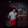 Restaurant worker wearing red apron, Souvla-King