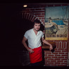 Restaurant worker wearing red apron, Souvla-King