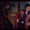 Two men in brown jackets, Souvla-King
