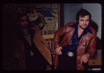 Two men in brown jackets, Souvla-King