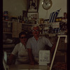 Two bakery workers behind the counter, Poseidon