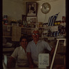 Two bakery workers behind the counter, Poseidon