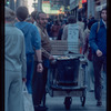 Pretzel vendor wearing brown shirt