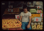 Fruit stand worker