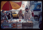 Sabrett vendor in sheerling coat