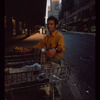 Pretzel vendor wearing yellow shirt