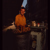 Pretzel vendor wearing yellow shirt