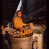 Pretzel vendor wearing yellow shirt