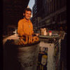 Pretzel vendor wearing yellow shirt