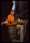 Pretzel vendor wearing yellow shirt