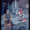 Pretzel vendor wearing hat
