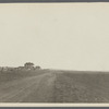 View of road to Sagg Beach. Looking south from Sagg Main Street, south of Bridge Lane. House in foreground: Newlan (1924). Bridgehampton, Southampton