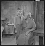 Charles Richardson and Claudia McNeil in the stage production A Raisin in the Sun