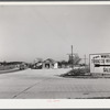 Intersection on main highway with road turning off to right for Wendell. Wake County, North Carolina