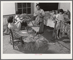 The Titus Oakley family stripping, tying and grading tobacco in their bedroom. Shoofly, Granville County, North Carolina. See subregional notes. November 16, 1939