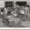 The Titus Oakley family stripping, tying and grading tobacco in their bedroom. Shoofly, Granville County, North Carolina. See subregional notes. November 16, 1939