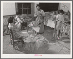 The Titus Oakley family stripping, tying and grading tobacco in their bedroom. Shoofly, Granville County, North Carolina. See subregional notes. November 16, 1939