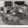 The Titus Oakley family stripping, tying and grading tobacco in their bedroom. Shoofly, Granville County, North Carolina. See subregional notes. November 16, 1939