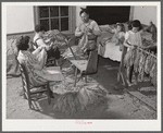 The Titus Oakley family stripping, tying and grading tobacco in their bedroom. Shoofly, Granville County, North Carolina. See subregional notes. November 16, 1939