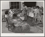 The Titus Oakley family stripping, tying and grading tobacco in their bedroom. Shoofly, Granville County, North Carolina. See subregional notes. November 16, 1939