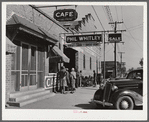 Black people waiting to go to work at one o'clock in warehouse and tobacco stem factory. Wendell, Wake County, North Carolina