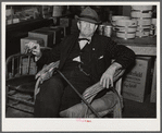 Mr. R.B. Whitley visiting in his general store. He is president of the bank and owns and runs practically all of the town, he is a big landowner, owns Whitley-Davis Farm and a cotton mill in Clayton. He said he cut down the trees and pulled the stumps out