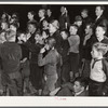 Children at pep rally cheering for Kay Kyser at North Carolina University. Chapel Hill, Orange County, North Carolina