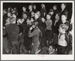 Children at pep rally cheering for Kay Kyser at North Carolina University. Chapel Hill, Orange County, North Carolina