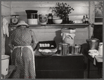 One of the Wilkins family making biscuits for dinner on cornshucking day at Mrs. Fred Wilkins' home near Tallyho, Granville County. North Carolina