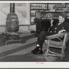 Mr. R.B. Whitley visiting in his general store. He is president of the bank and practically owns and runs the town. He is a big landowner, owns Whitley-Davis Farm and a cotton mill in Clayton. He said he cut down the trees and pulled up the stumps in that