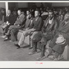 Spectators and witnesses on second day of Superior Court during trial of automobile accident case during court week in Granville County Courthouse, Oxford, North Carolina. See subregional notes (Odum) November 22, 1939