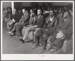 Spectators and witnesses on second day of Superior Court during trial of automobile accident case during court week in Granville County Courthouse, Oxford, North Carolina. See subregional notes (Odum) November 22, 1939