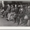 Spectators and witnesses on second day of Superior Court during trial of automobile accident case during court week in Granville County Courthouse, Oxford, North Carolina. See subregional notes (Odum) November 22, 1939