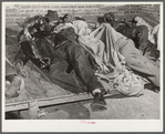 Farmers sleeping in Black camp room in warehouse. They often must remain overnight or several days before their tobacco is auctioned. Durham, North Carolina