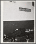 Farmers must often wait overnight or for several days before their tobacco is sold at auction. They sometimes hang around in cafes or pool rooms, sleeping most anywheres. Durham, North Carolina