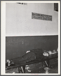 Farmers must often wait overnight or for several days before their tobacco is sold at auction. They sometimes hang around in cafes or pool rooms, sleeping most anywheres. Durham, North Carolina