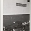 Farmers must often wait overnight or for several days before their tobacco is sold at auction. They sometimes hang around in cafes or pool rooms, sleeping most anywheres. Durham, North Carolina