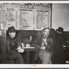 Farmers must often wait overnight or for several days before their tobacco is sold at auction. They sometimes hang around in cafes or pool rooms, sleeping most anywheres. Durham, North Carolina