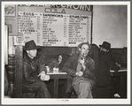 Farmers must often wait overnight or for several days before their tobacco is sold at auction. They sometimes hang around in cafes or pool rooms, sleeping most anywheres. Durham, North Carolina