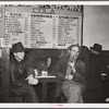 Farmers must often wait overnight or for several days before their tobacco is sold at auction. They sometimes hang around in cafes or pool rooms, sleeping most anywheres. Durham, North Carolina