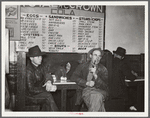 Farmers must often wait overnight or for several days before their tobacco is sold at auction. They sometimes hang around in cafes or pool rooms, sleeping most anywheres. Durham, North Carolina