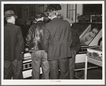 Farmers must often wait overnight or for several days before their tobacco is sold at auction. They sometimes hang around in cafes or pool rooms, sleeping most anywheres. Durham, North Carolina