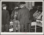 Farmers must often wait overnight or for several days before their tobacco is sold at auction. They sometimes hang around in cafes or pool rooms, sleeping most anywheres. Durham, North Carolina