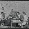 Publicity photograph of Fred Sears and unidentified staff in the office of the Westchester County Playhouse