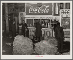 Lunch stand and tobacco inside entrance to warehouse at end of auction sale. Durham, North Carolina