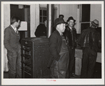 Farmers must often wait overnight or for several days before their tobacco is sold at auction. They sometimes hang around in cafes or pool rooms, sleeping most anywheres. Durham, North Carolina