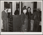 Farmers must often wait overnight or for several days before their tobacco is sold at auction. They sometimes hang around in cafes or pool rooms, sleeping most anywheres. Durham, North Carolina