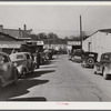 Street in warehouse district during tobacco auction sales. Durham, North Carolina