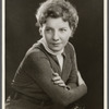 Publicity photograph of Mary Philips with arms crossed